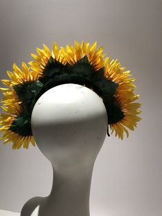 Sunflower Flower Fascinator- Yellow Headband- Mad Hatter Party- Tea Party- Kentucky Derby- Wedding Garden Party Hello, This headpiece is made with 6 sunflower that are about 5 inches wide. Flowers are tilted for extra height. Perfect for fall and anyone who loves sunflowers. It is attached to a black covered skinny headband and is adjustable. Leaves finish off the back. It's very comfortable and will fit any size head. 10 to 90! I've been making hair pieces over 20 years. I love what I do and I Sunflower Headpiece, Wedding Garden Party, Kentucky Derby Wedding, Derby Wedding, Yellow Headband, Flower Headdress, Mad Hatter Party, Flower Fascinator, Making Hair