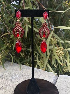 Red Chandelier Earrings For Formal Events, Formal Red Chandelier Earrings, Red Drop Crystal Earrings For Evening, Red Rhinestone Party Jewelry, Red Sparkly Jewelry For Formal Occasions, Ruby Dangle Earrings For Party, Valentine's Day Formal Crystal Earrings, Red Glamorous Chandelier Earrings For Party, Glamorous Red Chandelier Earrings For Party