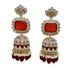 The Maroon Jiya Earrings are unique, and lightweight Jhumkas with Kundan, Meenakari and Gold-Plating on beautiful hydro beads. Specifications Materials used: Kundan, Meenakari, hydro beads, Gold Plating Weight: 41 g Height: 3.5 inches At Romikas, we pride ourselves on the craftsmanship and high quality of our jewelry, designed to enhance your natural beauty. Please contact us with any questions. Meenakari Bridal Earrings For Puja, Bridal Meenakari Earrings For Puja, Kundan Fusion Jhumkas, Fusion Kundan Jhumkas Drop Earrings, Fusion Style Kundan Jhumkas, Navratri Meenakari Earrings Gift, Heavy Multicolor Earrings For Puja, Fusion Style Earrings With Latkans For Festivals, Navratri Gift Meenakari Earrings