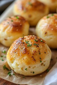 small rolls with herbs sprinkled on them