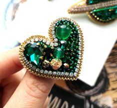 Green Embellished Jewelry For Gifts, Unique Rhinestone Brooch For Gift, Luxury Elegant Heart Brooches, Green Beaded Brooches As Gift, Green Beaded Brooches For Gift, Handmade Heart-shaped Brooches For Valentine's Day, Beaded Heart Brooch, Vintage Heart Shaped Brooch, Luxury Heart-shaped Brooch