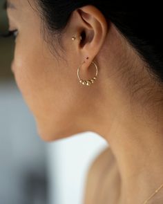 Minimalist, high quality, and timeless. Very secure and comfortable to wear. * 1 piece per order* * 14k Gold post and backing * 18 gauge (1mm Thick) * Post Length : 6mm Options: CZ or Gold Bead ball * CZ: 2mm or 2.5mm * Ball: 2.5mm or 3mm ■ SHIPPING UPGRADES You can find shipping upgrades options in the drop bar menu when you check out. * Within the U.S Regular First-class : 2-6 business days Priority : 2-3days Express : 1-2 days * International International Priority : 6-10 Business days Rush I Dainty Yellow Gold Piercings For Everyday Wear, Dainty Yellow Gold Cartilage Earrings For Everyday, 14k Gold-filled Yellow Gold Cartilage Earrings, Delicate 14k Gold Huggie Cartilage Earrings, Minimalist Internally Threaded Piercings For Everyday, Everyday 14k Gold Round Piercings, Everyday Round 14k Gold Piercings, Minimalist Yellow Gold Cartilage Earrings For Everyday, Simple Internally Threaded Jewelry For Everyday