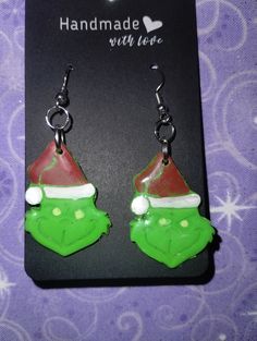 Grinch polymer clay earrings Gift Polymer Clay Earrings, Unique Polymer Clay Earrings For Gift, Unique Polymer Clay Earrings For Gifts, Hand Painted Polymer Clay Earrings For Gift, Gift Clay Drop Earrings, Clay Jewelry With Matching Earrings For Gift, Hand Painted Resin Earrings For Gifts, Clay Drop Earrings As Gift, Hand Painted Resin Earrings As Gift