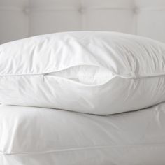 two pillows stacked on top of each other