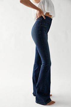 Forever flattering and flared jeans from our We The Free collection. **Fit:** Super high-rise, flared silhouette **Features:** Exaggerated yoking throughout, stretch denim fabrication, exposed button fly, flattering flat front and back **Why We | We The Free Jayde Flare Jeans at Free People in Dark Wash, Size: 28 Flair Jeans, High Waisted Flare Jeans, All Jeans, Country Outfits, Flared Jeans, Western Wear, Boho Outfits, Flare Jeans, Stretch Denim