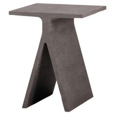 a concrete table with an irregular design on the top and bottom, sitting in front of a white background