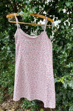 Comfy  slip dress/night gown to lounge around in.   Cotton lawn fabric is very soft and airy. A sweet and dainty floral print on a pink background.  Loose fitting with adjustable shoulder straps. Top of neckband to bottom of hem is 25 3/4 inches (65.4 cm) Size Small (38) - fits bust from 33.5" to 34.6" (85 cm to 88 cm) Material has been pre-washed.   Wash separately on a gentle cycle and hang to dry. Spring Cami Nightgown For Bedtime, Spring Bedtime Slip Dress With Spaghetti Straps, Summer Camisole Nightgown For Sleeping, Summer Slip Dress With Spaghetti Straps For Sleepover, Spring Slip Dress With Spaghetti Straps For Bedtime, Summer Spaghetti Strap Slip Dress For Sleepovers, Spring Sleepover Nightgown With Spaghetti Straps, Spring Sleepover Sleepwear With Spaghetti Straps, Spring Camisole Nightgown For Sleep