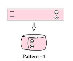 a pink object with two buttons on it and an arrow pointing to the left side