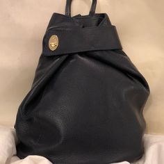 Stylish Handbag Backpack All Leather Deep Navy, Could Serve As Black As Well Gold Tone Hardware Zipper Closure With Additional Toggle Wrap At Top Adjustable Leather Back Straps Hand Carry As Well 4” Drop Zipper Phone Pocket On Back For Added Security Interior Has Zipper Pocket And Slip Pocket Roomy Inside Purchased At A Boutique - No Brand Name On Bag Generic Dust Bag Included Nwt Excellent Condition Elegant Travel Backpack With Leather Backing, Chic Soft Leather Backpack For Errands, Elegant Travel Backpack With Leather Lining, Modern Soft Leather Backpack For Errands, Elegant Everyday Backpack With Leather Lining, Luxury Soft Leather Everyday Backpack, Designer Everyday Backpack Shoulder Bag, Elegant Rectangular Backpack With Leather Backing, Leather Top Handle Backpack For Errands