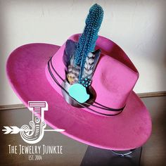 If you’re looking for the perfect accessory to complement your favorite boho style, look no further. This Boho-Style Western Felt Hat w/ Natural Feather & Turquoise Hat Accent by The Jewelry Junkie is absolutely everything that you need. Not only is it easy to incorporate into any and all outfits, but the genuine leather and natural feathers of the band immediately elevate whatever it is you’re wearing. One Size Hat with adjustable inner hat liner (see last photos) The same primary feathers will Turquoise Wide Brim Fitted Hat, Bohemian Fitted Fedora With Short Brim, Fitted Bohemian Fedora With Flat Brim, Bohemian Wide Brim Fitted Hat, Trendy Hats For Kentucky Derby Festival, Bohemian Pink Hat Band With Curved Brim, Bohemian Felt Hat For Festival, Pink Bohemian Hat Band With Curved Brim, Bohemian Fitted Felt Hat With Short Brim