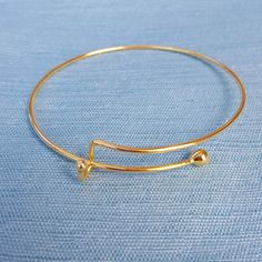 "This is gold toned single bar adjustable bangle bracelet. Material: Zinc Alloy Color: Gold Toned Measurement: 21 cm(8 2/8\") long You get 1 bracelet For bulk amounts request a custom order by clicking on the \"Request Custom Order\" button. Bulk amounts may sometimes take more days to ship out. Items ship within 1 business day" Modern Gold Jewelry With Adjustable Band, Adjustable Gold Bangle Bracelet, Gold Metal Bangle Bracelet With Extender, Gold Adjustable Bangle Bracelet, Gold Hoop Cuff Bracelet Gift, Gold Hoop Cuff Bracelet As Gift, Gold Cuff Bracelet With Adjustable Band As Gift, Gold Bangle With Adjustable Band, Gold Adjustable Band Bracelet For Gift