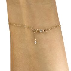 A cute and dainty 14k gold four diamond bracelet, featuring diamonds in the front and a diamond in the back. A wonderful addition to your stacked set. ---------------DETAILS--------------- - (4) .03 carat solitaire diamonds, G SI+ color/clarity, 2 mm - Set in 14k gold bezel settings - 14k gold cable chain with a lobster clasp closure, 1.3 mm - Available in 14k white, yellow or rose gold - Sizes 6 - 7 inches and custom upon request Dainty Adjustable Diamond Bracelet With Diamond Accents, Fine Jewelry 14k Gold Diamond Bracelet With Delicate Chain, Delicate Gold Diamond Bracelet With Single Diamond, Dainty Yellow Gold Diamond Bracelet With Diamond Cut, Dainty Diamond Chain Bracelet, Formal Yellow Gold Diamond Bracelet With Adjustable Chain, Diamond Bracelet With Delicate Chain, Dainty Diamond Bracelet With Single Cut Diamonds As Gift, Delicate 14k Gold Diamond Bracelet With Single Diamond