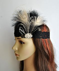 Beautiful Vintage Style, Great Gatsby lace flapper headband with feathers. Made of - black stretchy floral lace (the floral pattern may vary as it is handmade item ) - embellished with sparkling crystal rhinestone brooch - mix of light black ostrich feathers and hand curled ivory peacock eyes Perfect for a Great Gatsby or a 1920's party or any occasion! Can be worn with feathers on the right or left side of head. As it stretchy it fits everybody head Vintage inspired - stylish with modern look ! Vintage Adjustable Feather Headpieces, Vintage Adjustable Headpieces With Feathers, Adjustable Vintage Headpieces With Feathers, Black Gatsby Style Wedding Headpiece, Black Gatsby Style Fascinator, Adjustable Gatsby Style Costume Hats For Evening, Adjustable Gatsby Evening Headpiece, Elegant Adjustable Headpieces For Costume Party, Adjustable Gatsby Style Evening Costume Hat