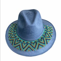 Suede Cowgirl Hat With Chaquira Beaded Hat Band. The Hat Band Is Removable, Ties To Adjust. It Can Also Be Use As A Necklace. Sweatband On Hat Makes It More Comfortable To Wear. Includes Hat And Hat Band. Size-Medium Handmade In Chiapas Mexico. Casual Blue Hat Bands For Festivals, Blue Adjustable Felt Hat With Short Brim, Bohemian Blue Hat Bands For Vacation, Bohemian Blue Hat Band For Vacation, Blue Western Felt Hat For Beach, Blue Felt Hat For Beach Summer, Blue Felt Hat For Beach In Summer, Blue Felt Beach Hat For Summer, Casual Adjustable Blue Felt Hat