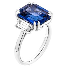 3 stone ring in Platinum Center stone: 7.97ct Blue Emerald cut Sapphire Certified: CDC2201543 Country of origin: Sri Lanka Side stones: 0.66ct F VVS trapezoids Size: 6.5 Luxury Emerald Cut Sapphire Ring With Center Stone, 3 Stone Ring, Blue Emerald, 3 Stone Rings, Three Stone Rings, Three Stone, Stone Ring, Emerald Cut, Stone Rings