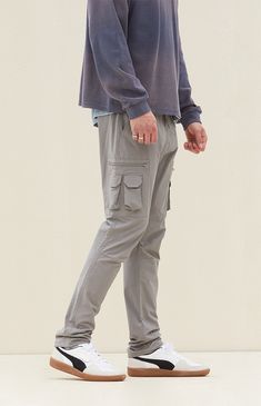 Casual meets cool with the new Eco Stretch Gray Slim Cargo Pants from PacSun. This go-to pair is designed with an elastic stretch waistline, adjustable drawstrings, side pockets, zip cargo pockets, a drawcord hem, and a slim fit.

Learn more about PacSun eco items Urban Gray Cargo Pants With Pockets, Gray Relaxed Fit Cargo Pants For Streetwear, Urban Gray Cargo Pants With Side Pockets, Sporty Gray Full-length Cargo Pants, Pacsun Cargo Pants, Pacsun, Cargo Pants, Slim Fit, Grey