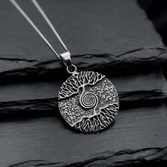 Real 925 Sterling Silver Large Triquetra Celtic Tree of life Necklace This simple yet elegant necklace features a sterling silver Tree of life pendant on a Dainty Sterling silver cable chain. Charm Measures 38 x 27mm Jewelry will come in a gift box * Please read shop policy before placing an order * *JEWELRY CARE* Sterling Silver will tarnish over time, but to help keep your jewelry looking beautiful - Clean with a soft dry cloth after wear and store inside an airtight bag or container. Remember Symbolic Round Necklaces Stamped 925, Silver Engraved Nature-inspired Necklace, Engraved Sterling Silver Spiral Jewelry, Silver Spiral Necklace For Gifts, Nature-inspired Engraved Sterling Silver Necklace, Spiral Sterling Silver Necklace In Silver, Symbolic Spiral Sterling Silver Jewelry, Spiral Sterling Silver Jewelry With Oxidized Finish, Unique Spiral Sterling Silver Necklace