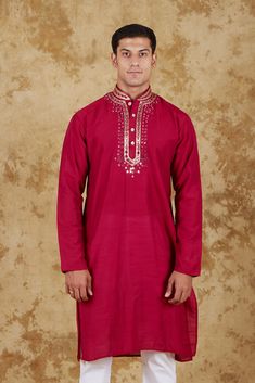 Bluesaanchi Mirror Magic Red Men's Kurta Set  The Bluesaanchi Mirror Magic Red Men's Kurta Set is a perfect blend of tradition and modernity. Crafted with exquisite attention to detail, this kurta set features intricate mirror work that enhances its appeal. Ideal for festive occasions or casual outings, it combines comfort with style, making it a must-have in every man's wardrobe.  Key Features  Elegant mirror work for a sophisticated look  Soft and breathable fabric for all-day comfort  Traditional design with a contemporary twist  Perfect for festive and casual occasions   Specifications  Brand: Bluesaanchi  Color: Red  Size Range: Available in multiple sizes  Pattern: Mirror work   Material & Care  Material: Premium cotton blend  Care Instructions: Hand wash in cold water, do not bleach Ceremonial Gota Work Kurta, Unstitched Gota Work Kurta For Ceremonial Occasions, Traditional Chanderi Bandhgala With Gota Work, Transitional Red Kurta With Zari Work, Bollywood Style Red Kurta For Transitional Season, Traditional Long Sleeve Sherwani With Gota Work, Ceremonial Kurta With Gota Work And Traditional Drape, Traditional Fit Straight Kurta For Festive Occasions, Red Chanderi Kurta For Puja