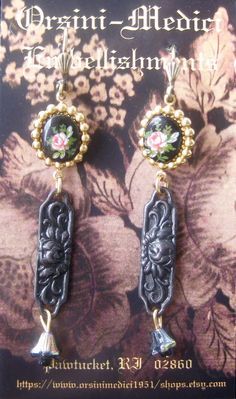 In this jewelry collection, my aesthetic focus was to evoke the Victorian and Edwardian era, of romanticized femininity, yet update it for todays fashion forward thinking woman. This pair consists of a repousse' stamping in the Victorian mourning style, and a floral transferware cabochon.  A tiny Czech glass floral bell finishes the length.  The gold plated brass, lever back wires are nickel free. FREE gift wrapping upon request!! Antique Finish Vintage Earrings, Vintage Stamped Jewelry, Elegant Stamped Earrings As Gift, Thinking Woman, Deco Beads, Steampunk Earrings, Victorian Steampunk, Forward Thinking, Edwardian Era