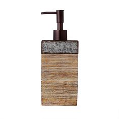 a soap dispenser that is made out of wood and stone with a metal faucet