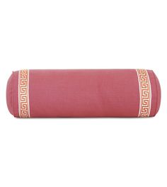 a pink yoga mat with gold greek border