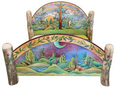 an artisticly painted bed with wooden posts