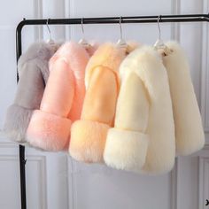 Fluffy Fur Coat For Cold Weather, Fluffy Fur Coat For Cold Weather In Spring, Fluffy Faux Fur Outerwear For Spring, Trendy Fluffy Fur Coat For Cold Weather, Spring Faux Fur Outerwear In Mink Color, Spring Fluffy Faux Fur Coat, Trendy Winter Fur Coat With Faux Fur Trim, Trendy Fluffy Fur Coat For Fall, Winter Plush Long Sleeve Outerwear