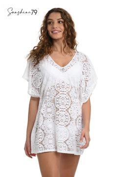 This resort-ready, bohemian staple balances a cool, coastal vibe with a touch of femininity. This V-neck caftan that ties at the neck in back with gold logo cord ends takes you from a dip to dinner in effortless style. Styled with breezy dolman sleeves, this cover-up gathers just below the bust on each side to create gentle ripples of fabric for a flowy fit. [split] Details V-neck caftan Ties at neck in back Dolman sleeves Breezy silhouette Fabric 100% Cotton Bohemian V-neck Kaftan For Brunch, V-neck Beach Dress With Lace Trim, Spring V-neck Beachwear Tunic, V-neck Beach Dress With Lace Trim As Cover-up, Beachy Flowy V-neck Kaftan, Bohemian White V-neck Cover-up, Crochet Lace Festival Cover-up, Unlined V-neck Cover-up For Vacation, Vacation Tunic Cover-up