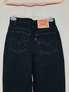 "Levis Black Denim Jeans - XS Flat measurements 26:waist 32\"hip 38\"length 100% Cotton Slim Fit Straight leg" Black Mid-rise Jeans With Belt Loops, High Waist Black Jeans With Belt Loops, 90s Style Black Mid-rise Bottoms, 90s Black Mid-rise Bottoms, 90s Style High Waist Black Bottoms, High Rise Black Jeans With Hip Pockets, 90s Black Jeans With Pockets, Fitted Black Jeans With Belt Loops, Fitted Black Jeans With Hip Pockets