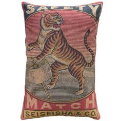 a pillow with a tiger on it and the words, seiseishaa & co