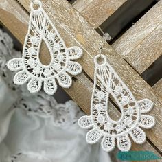 Beautiful embroidered white lace earrings by JOHANNIKA for that special bride! Our whimsical drop earrings come with a silver plated ear wire. They are lightweight and comfortable to wear and include a plastic backing for added security. They can be hand washed and not lose their shape! These romantic JOHANNIKA earrings come in a beautiful presentation and can include a special message. Matching necklace is also available - feel free to contact us. White Bohemian Teardrop Earrings For Pierced Ears, White Filigree Drop Earrings, White Bohemian Teardrop Earrings, White Filigree Dangle Jewelry, White Bohemian Filigree Earrings, Gift White Drop Chandelier Earrings, White Teardrop Earrings For Wedding, Delicate White Teardrop Earrings For Wedding, White Teardrop Chandelier Earrings For Wedding