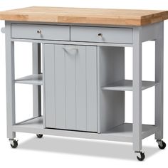 a white kitchen island with two drawers on wheels