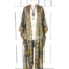 Gold Black Sheer Peacock Sequin Maxi Kimono Cover Up Measurements...Taken Flat -Across Width Seam To Seam: 40" -Length In The Photo: 51" Features -Lightweight Sheer Black Net -Accented With Metallic Gold Sequins -Gorgeous Peacock Design -Bohemian Gypsy Oversized Flowing Style -Generous Arm Holes Black Kaftan With Dupatta, Gold Bohemian Kaftan For Party, Elegant Silk Kimono For Festivals, Fitted Silk Bohemian Kimono, Bohemian Black Kaftan For Wedding, Bohemian Gold Kaftan For Festive Occasions, Festive Gold Bohemian Kaftan, Elegant Summer Festive Kimono, Elegant Fitted Kimono For Festival