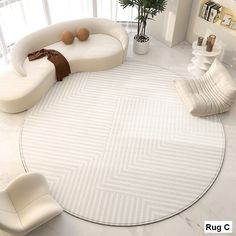 a living room with a round rug and white furniture