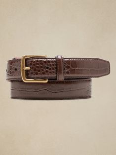 Sleek and streamlined, this embossed leather belt adds a bit of variety to your wardrobe.  LEATHER WORKING GROUP: By purchasing this product, you are supporting responsible leather manufacturing through the Leather Working Group.  Width: 1" (2. 5cm) Leather Brown Belt, Crocodile Belt, Money Belt, Buy List, Digital Closet, Designer Belts, Belt Style, Dress Belt, Brown Leather Belt