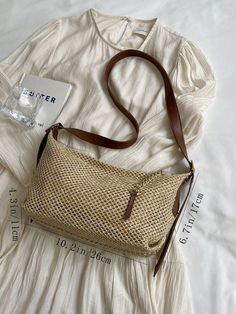 This chic woven bag in khaki is the ideal vintage summer accessory. With its timeless design and durable material, it is perfect for any occasion. Whether you're heading to the beach or a picnic in the park, this bag will elevate your style while keeping your essentials secure. Features : Lightweight Color : Khaki Magnetic : No Details : Multi-compartment Type : Straw Bag, Hobo Bag Bag Size : Medium Style : Vintage, Fashionable Strap Type : Adjustable Pattern Type : Plain Closure Type : Zipper C Khaki Rectangular Shoulder Bag For Spring, Trendy Khaki Shoulder Bag For Summer, Trendy Braided Beige Crochet Bag, Summer Khaki Shoulder Bag For Daily Use, Summer Khaki Shoulder Bag For Everyday, Khaki Shoulder Bag For Everyday Summer Use, Casual Khaki Rectangular Straw Bag, Chic Khaki Bags For Summer, Trendy Beige Braided Bag