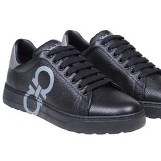 Salvatore Ferragamo Gancini-Logo Printed Lace-Up Sneakers Men's Black 12 $660. Dimensions: Heel: 1cm 100% Leather Made In Italy Designer Model Number: Numbernero Designer Colour: Black New Season Fw22 Calfskin Sneakers Black Colour Grained Leather Finish Gancini Logo On The Side Model With Round Tip Contrasting Heel Closure With Laces Leather Interior Rubber Sole Calfskin Composition Made In Italy Made In: Italy Luxury Custom Sneakers With Textured Sole And Round Toe, Custom Leather Sneakers With Embossed Logo And Round Toe, Designer Custom Sneakers With Contrast Sole In Calf Leather, Luxury Black Sneakers With Rubber Sole, Designer Calf Leather Sneakers With Textured Sole, Black Custom Sneakers With Calf Leather And Round Toe, Custom Black Calf Leather Sneakers With Round Toe, Black Custom Sneakers With Calf Leather, Luxury Wingtip Sneakers With Rubber Sole