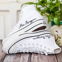 Wedding Sneakers for Bride, Name and Date Embroidered Converse Platform, Personalized Bridal Sneaker, Floral Embroidery Shoes, Unique Gifts 💚 Immerse yourself in the intricate craftsmanship as we lovingly hand embroider rustic flowers onto your chosen Converse pair 💚 🌿 The listed price encompasses both the Converse Shoes and the showcased Embroidery Designs. 1. MANUFACTURING PROCEDURE 🌿 Upon receiving your order, we initiate the shoe preparation process. If your chosen shoes are readily avai Converse Wedding Shoes Bride, Wedding Catalog, Floral Embroidery Shoes, Wedding Sneakers For Bride, Converse Chuck 70s, Bridal Converse, Converse Wedding Shoes, Bridal Sneakers, Embroidered Converse