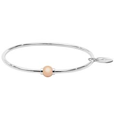 The bracelet that began it all...the original Cape Cod Single Ball Bracelet is still the most popular. It's timeless elegance and fine craftsmanship make this the perfect piece for any age and any style. - Bracelet is handcrafted of fine quality 925 sterling silver and 14kt rose gold for a lifetime of wear- Bracelet comes in a size 7"- Rose gold ball is solid- Manufactured in the USA- A Lifetime Guarantee accompanies every Cape Cod bracelet- Free cleaning and inspection at Day's for life of this Adjustable Polished Rose Gold Bangle, Adjustable Rose Gold Bangle With Polished Finish, Rose Gold Stackable Sterling Silver Bracelets, Classic Rose Gold Stackable Bracelets, Rose Gold Sterling Silver Jubilee Bracelet, Elegant Stackable Bangle Charm Bracelet, Rose Gold Sterling Silver Bangle Bracelet, Classic Sterling Silver Jubilee Bracelet In Rose Gold, Classic Adjustable Rose Gold Bangle