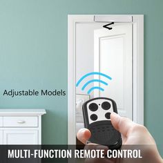 a person holding a remote control in front of a mirror with the words multi function remote control