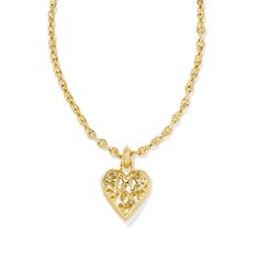 Sweet, always-on-trend, and full of shine, you can't help but fall for the Romy Statement Heart Necklace. Centered on a textured chain, this oversized heart pendant is the pop of personality your layered look needs. Designer, founder, and philanthropist Kendra Scott started her company in 2002, just three months after her first son was born. Her commitment to innovation, quality, customer service, and detail has taken her from a small startup to a billion-dollar brand. Kendra Scott is known for Kendra Scott Heart Necklace Clear, Bat Mitzvah Party, Necklace Inspiration, Necklaces Gold, Bow Necklace, Gold Heart Necklace, Accessories Jewelry Necklace, Gold Pendant Necklace, Layered Look