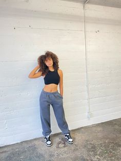 Dark grey sweatpant with pockets. Oversized fit. Manufactured in Los Angeles. Urban Style Gray Loungewear Bottoms, Gray Sweats With Elastic Waistband For Jogging, Urban Gray Loungewear Bottoms, Gray Sweatpants With Pockets For Loungewear, Gray Sweatpants With Elastic Waistband For Gym, Gray Activewear With Side Pockets For Loungewear, Gray Athleisure Pants With Pockets, Gray Casual Sweatpants For Loungewear, Gray Loungewear Activewear With Side Pockets