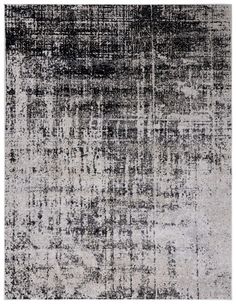 an abstract rug with black and white colors