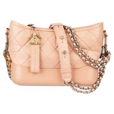 Brand: Chanel Product: Small Chanel Gabrielle Size: 21.6 l x 17.1 h x 7.6 d cm Strap Drop: 40.6 - 69.9 cm Colour: Dusty Pink Material: Grained Calfskin Leather Hardware: Gold & Silver Tone Series: 27 2019 Condition: Excellent: The product is in excellent condition, displaying minimal signs of wear. The product has been well-maintained and shows no significant flaws or damage. Additional Details: Slight colour transfer present on the base of the shoulder strap. Accompanied By: Chanel Dustbag Dior 30 Montaigne Bag, Chanel Mini Flap Bag Pink, Chanel Handbags Pink, Pink Chanel Flap, Light Pink Chanel Bag, Pink Bag With Gold-tone Hardware And Double Handle, Dior New Look, Chanel Suit, Vintage Chanel Bag