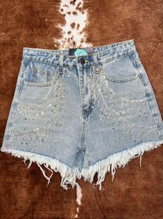 -Denim shorts with rhinestone fringe -Small (0-2), Medium (4-6), Large (8-10) Party Cutoff Denim Shorts, Party Denim Bottoms With Fringe, Rhinestone Fringe Denim Jean Shorts For Spring, Summer Party Jean Shorts With Rhinestone Fringe, High Waist Jean Shorts With Rhinestone Fringe For Party, Party Denim Jean Shorts With Rhinestones, Rhinestone Denim Jean Shorts For Party, Rhinestone Denim Jean Shorts, Party High-waist Jean Shorts With Rhinestone Fringe