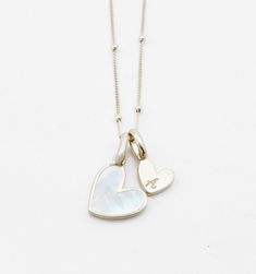 Mother of Pearl Initial Necklace – Rellery. For Valentine’s Day Heart Disc, Modern Gold Jewelry, Engraved Initials, Mother Of Pearl Necklace, Bracelet Chain, Meaningful Jewelry, Pearl Choker Necklace, Pearl Choker, Small Heart