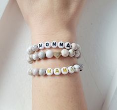 > Same Day Shipping Available when ordered by 12 PM (PST)< White Marble Beaded Name bracelet, Mama bracelet, Initial Bracelet. Customize a bracelet for you or someone you know add a name or initial and add a gold heart as well. There are two letter bead styles to choose from! Have fun customizing with your favorite words or sayings. How to order 1) Select a Size 2) Select a style 3) Add Name(s) to personalization box Handmade with Love and Care >Jewelry Care Tips< * Care should be us Handmade White Jewelry For Mother's Day, White Handmade Jewelry For Mother's Day, Customized Bracelets As Mother's Day Gifts, Handmade Name Bracelet For Mother's Day, Adjustable Beaded Jewelry As A Gift For Mom, Adjustable White Jewelry For Mother's Day, White Friendship Bracelets For Mother's Day, White Round Beads Jewelry For Mother's Day, Handmade Everyday Bracelets For Mother's Day