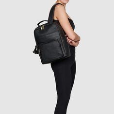 The Astra Backpack by Urban Originals is an everyday bag with enough room for your laptop, documents, and other daily essentials. Crafted from premium vegan leather, it combines style and functionality seamlessly. Chic Business Backpack, Sleek Travel Laptop Bag, Chic Standard Backpack For Work, Modern Black Backpack For Work, Modern Leather Backpack With Laptop Sleeve For Office, Versatile Leather Backpack With Adjustable Strap For Office, Versatile Backpack For Work, Versatile Backpack With Adjustable Strap For Work, Office Backpack With Laptop Sleeve