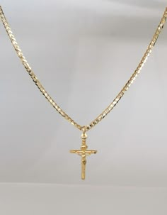 Real Gold Cross Necklace Made in Italy Guaranteed 10K Yellow GOLD, Stamped 10K This gold cross necklace is a beautiful piece for Christians for protection during uncertain times. Excellent for yourself or as a thoughtful gift to somebody you care about. 10K SOLID Gold Curb Chain: 1.5 mm, 2 mm, 3mm Choose Cross size (not including bail): Small: 30 mm x 18 mm x 4 mm Large: 45 mm x 28 mm x 5 mm Real Solid Gold Curb Chain is secured with a Solid Gold lobster clasp. Invest in SOLID GOLD: It's what's Mens Gold Jewelry Necklace, Luxury Men's Crucifix Necklace, Gold Plated Crucifix Necklace, Gold Cross Pendant Necklace With Box Chain, Gold Crucifix With Figaro Chain Jewelry, Gold Plated Cross Pendant Necklace With Gold Chain, Crucifix Cross Necklace With Box Chain, Gold Plated Cross Chain Necklace, Gold Cross Necklace With Box Chain