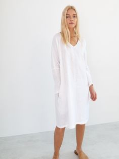 "FRIDA is a long sleeve linen dress with belt. DETAILS - Long sleeves - V neckline - Relaxed fit - Knee length - Self tie belt - Side seam pockets - 100% lightweight European linen fabric - Cut and sewn to order just for you in our studio COLOR - White, you can also choose other colors above - Fabric samples are available here https://www.etsy.com/listing/586569696/linen-fabric-samples SIZING & FIT - Relaxed fit - Length is approximately 38.5 inches / 98 cm - Bust is approximately 21 inches Summer V-neck Long Sleeve Dress For Daywear, V-neck Linen Dress For Workwear With Relaxed Fit, Relaxed Fit Linen V-neck Dress For Work, V-neck Linen Dress For Brunch, Linen V-neck Midi Dress For Brunch, White Linen V-neck Midi Dress, Chic V-neck Linen Dress With Relaxed Fit, Fall Linen Midi Dress For Brunch, Relaxed Fit V-neck Linen Dress For Work